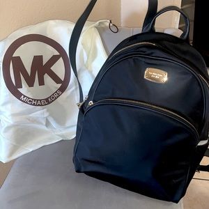 Black nylon backpack, Leather straps